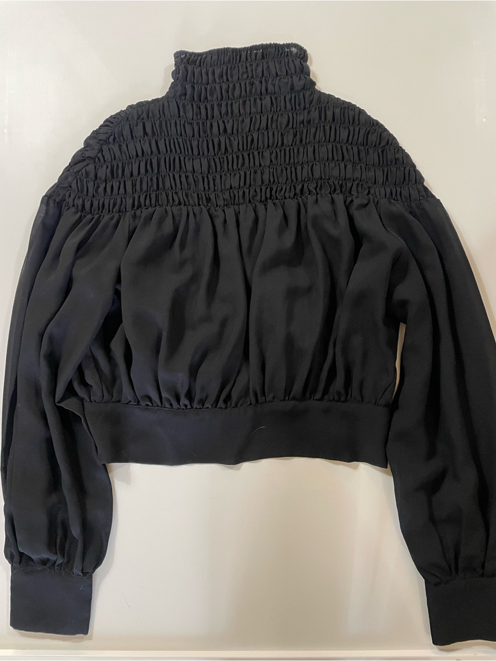 Icōne Black Smocked High-Neck Balloon Sleeve Top with Tie Up on The Back